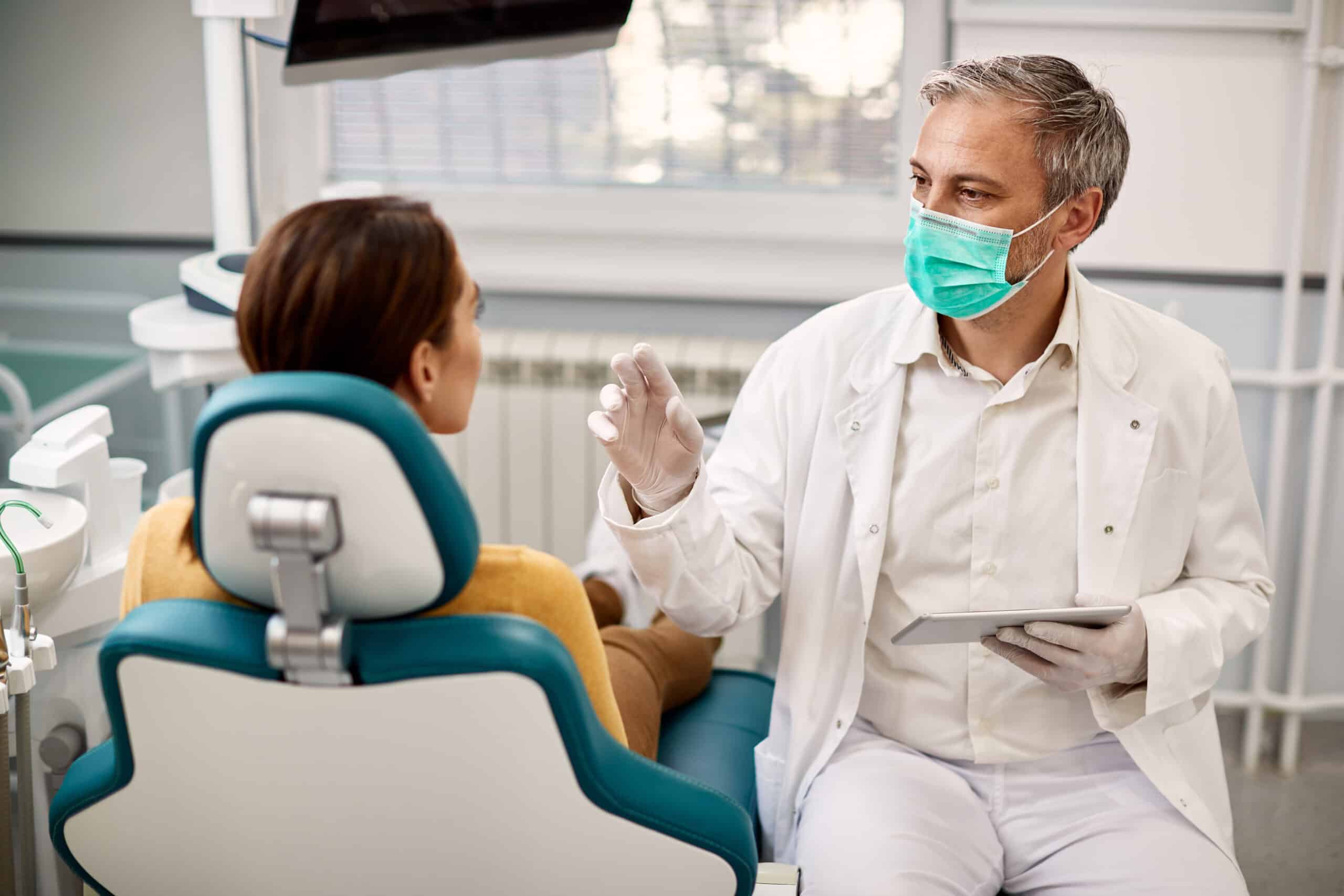 dentist asking questions to patient