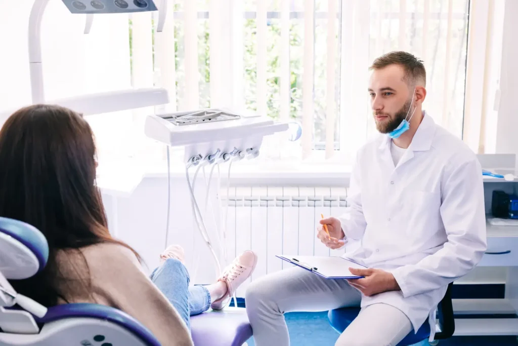 dentist consulting a patient