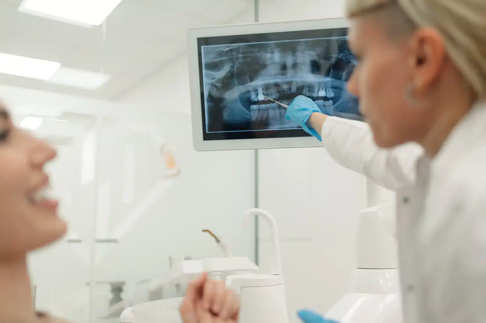 dentist showing dental xray
