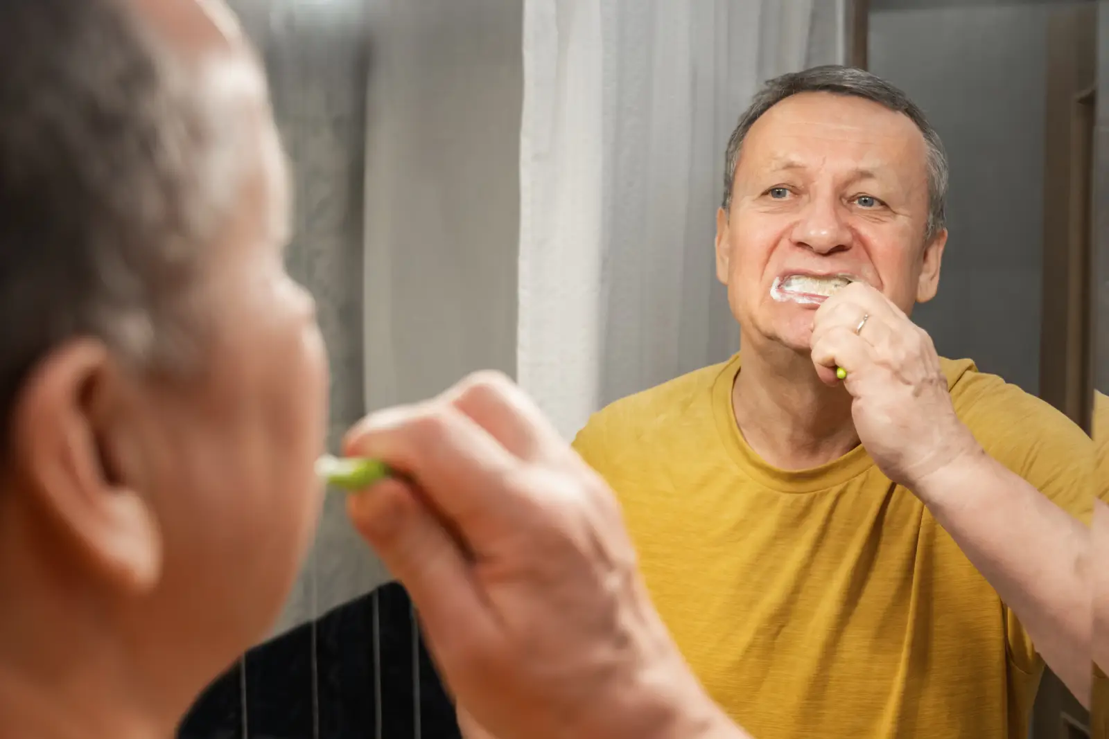 elderly maintaining dental hygiene