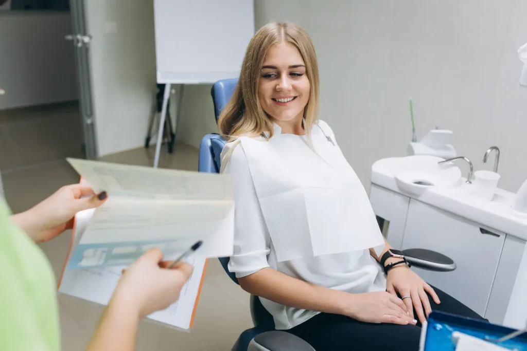 patient getting dental treatment after paying bills from super funds.