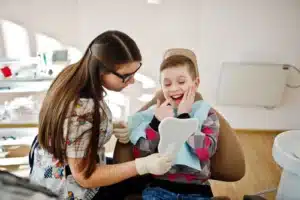dentist comforting a kid