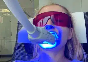 women getting her theeth whitened