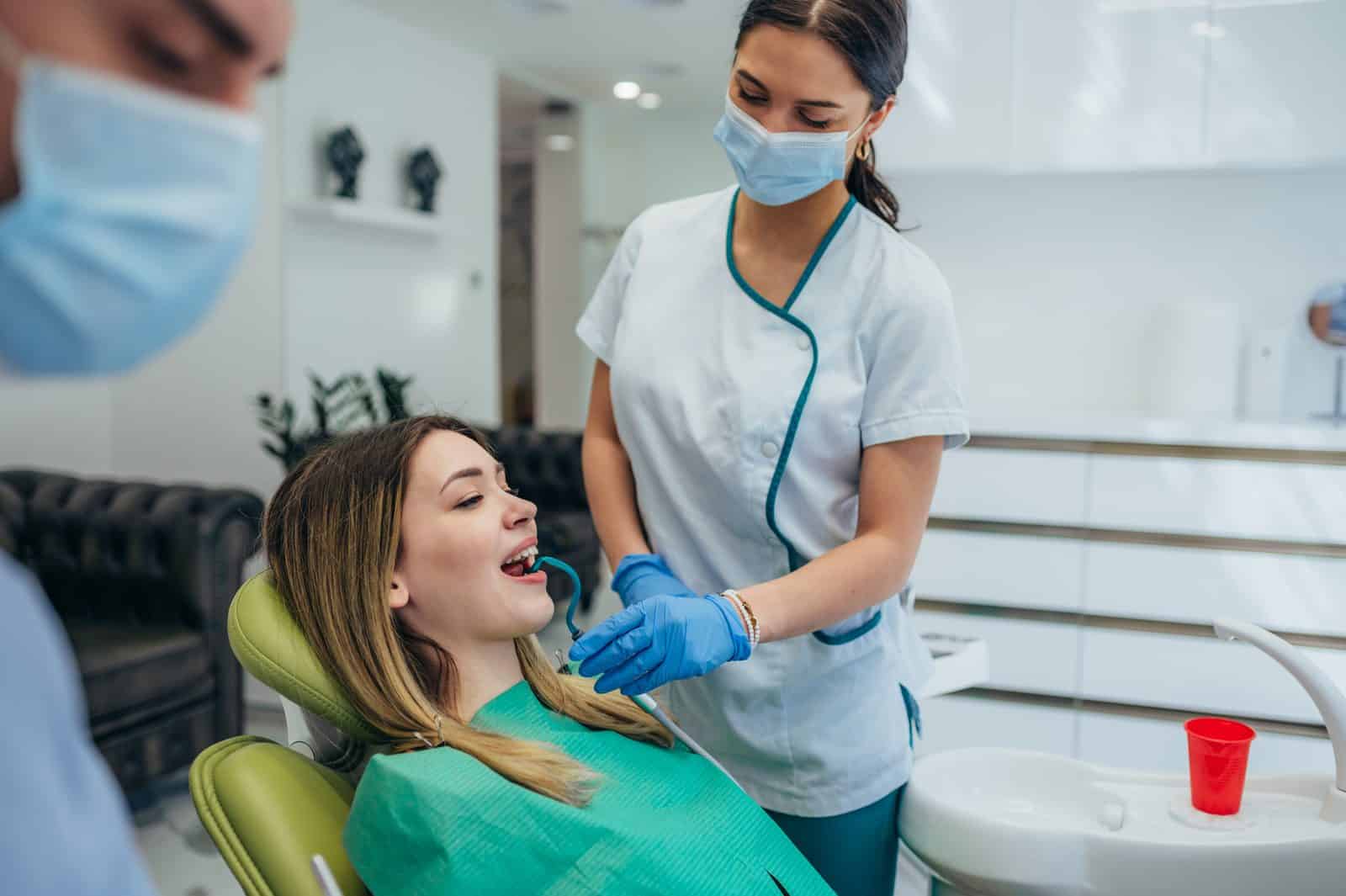 Dentist performing a dental check-up and examination at Dental Nook Brisbane