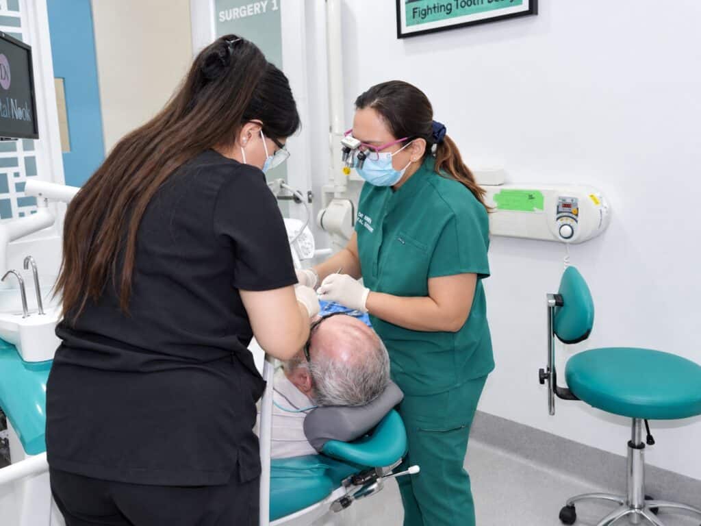 Dental Nook dentists providing care to a patient